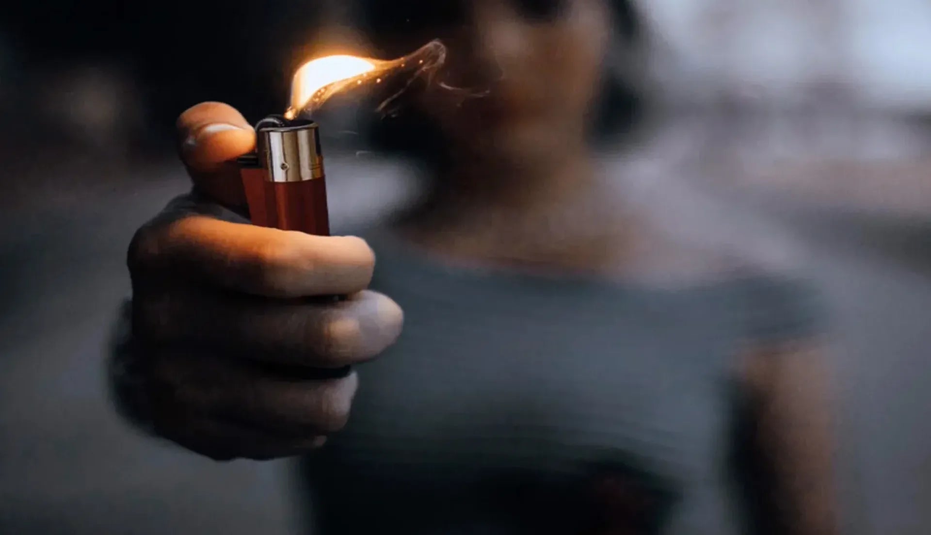Clipper Blurry Person Holding Lighter Background